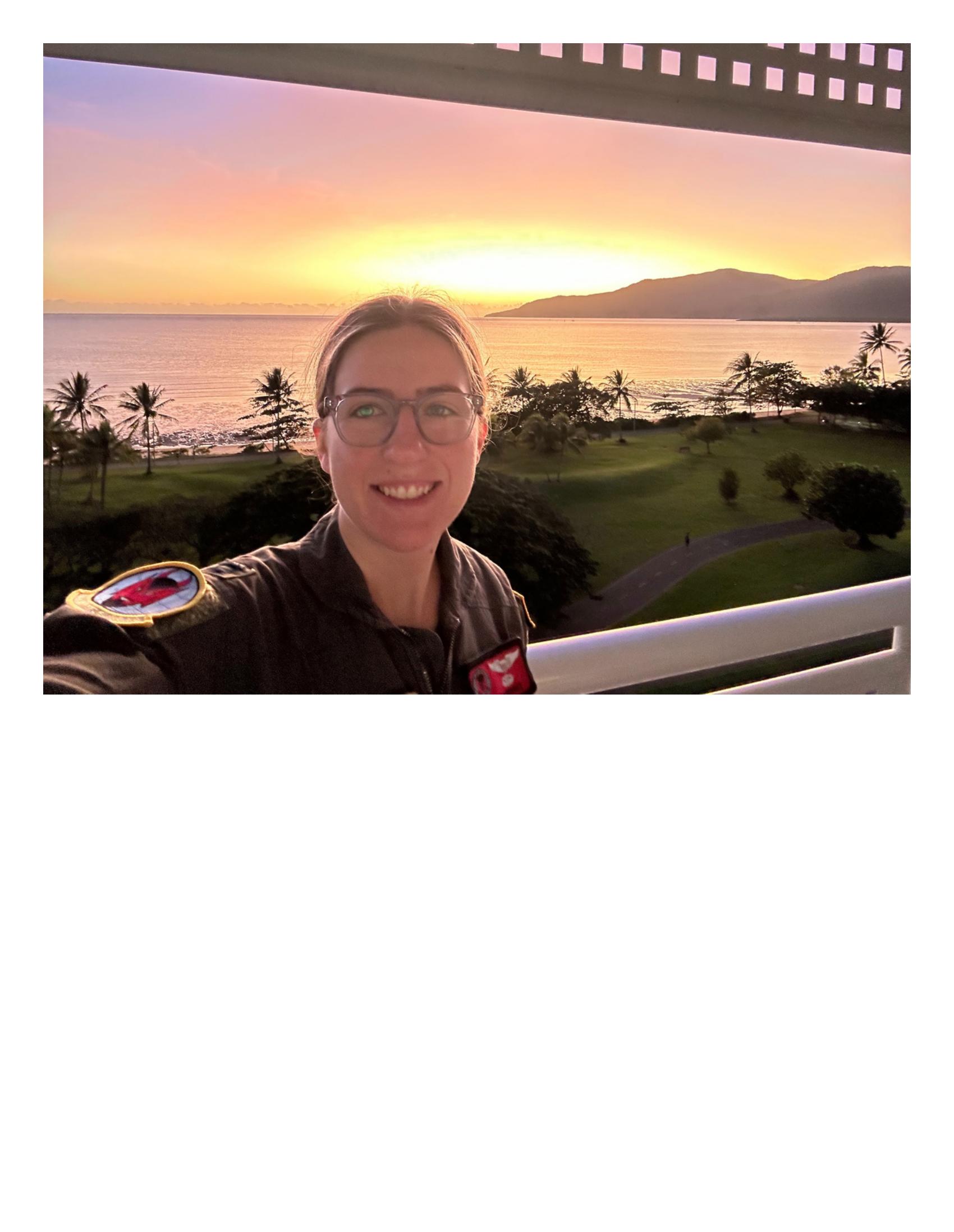 Full-bleed personal photograph from Abby's Air Force and travel archive used in the TDWines deck (reference image 13).